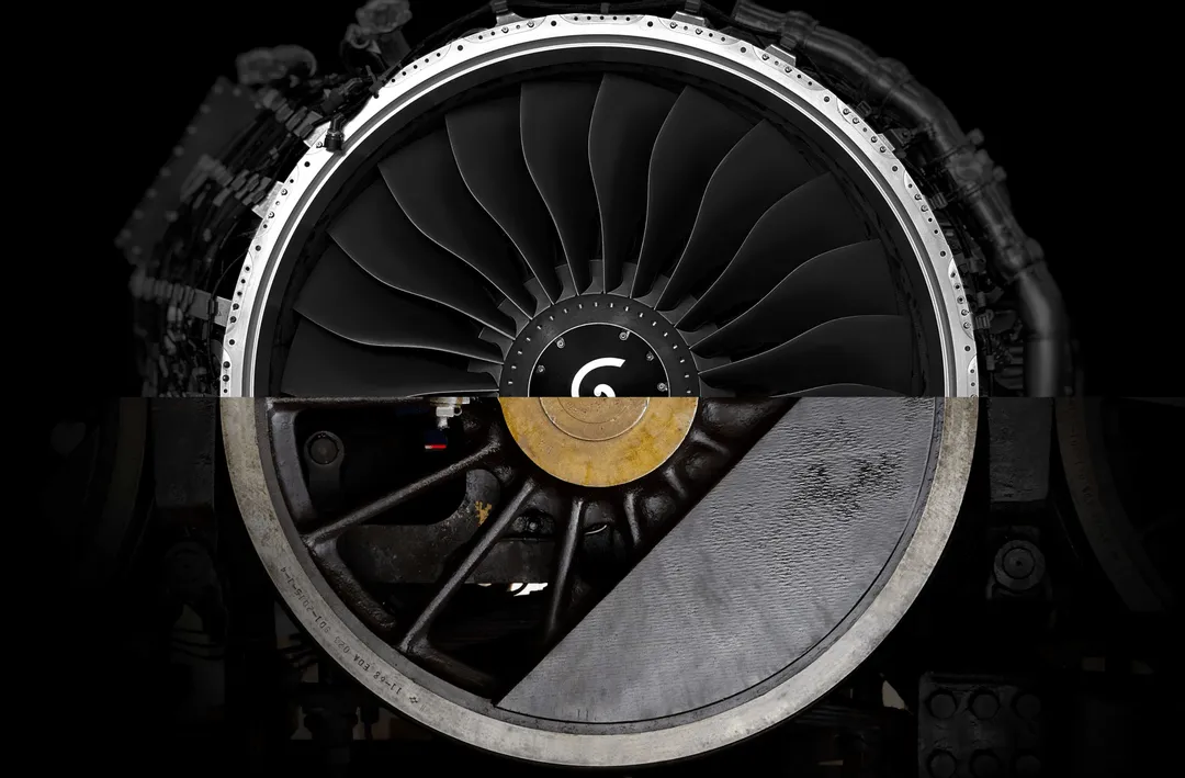 A jet engine turbine fused with a steam-locomotive wheel — the hybrid of two technologies